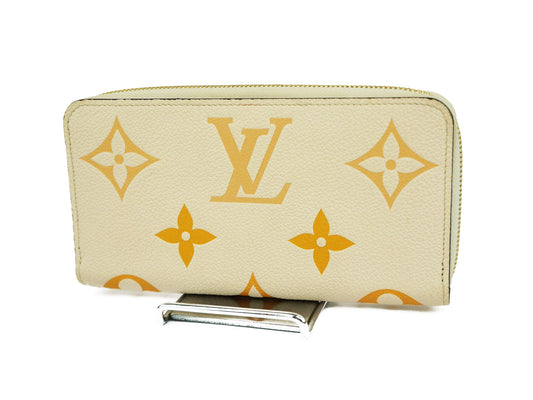 Louis Vuitton: Empreient Cream Saffron Zippy Long Wallet M80402